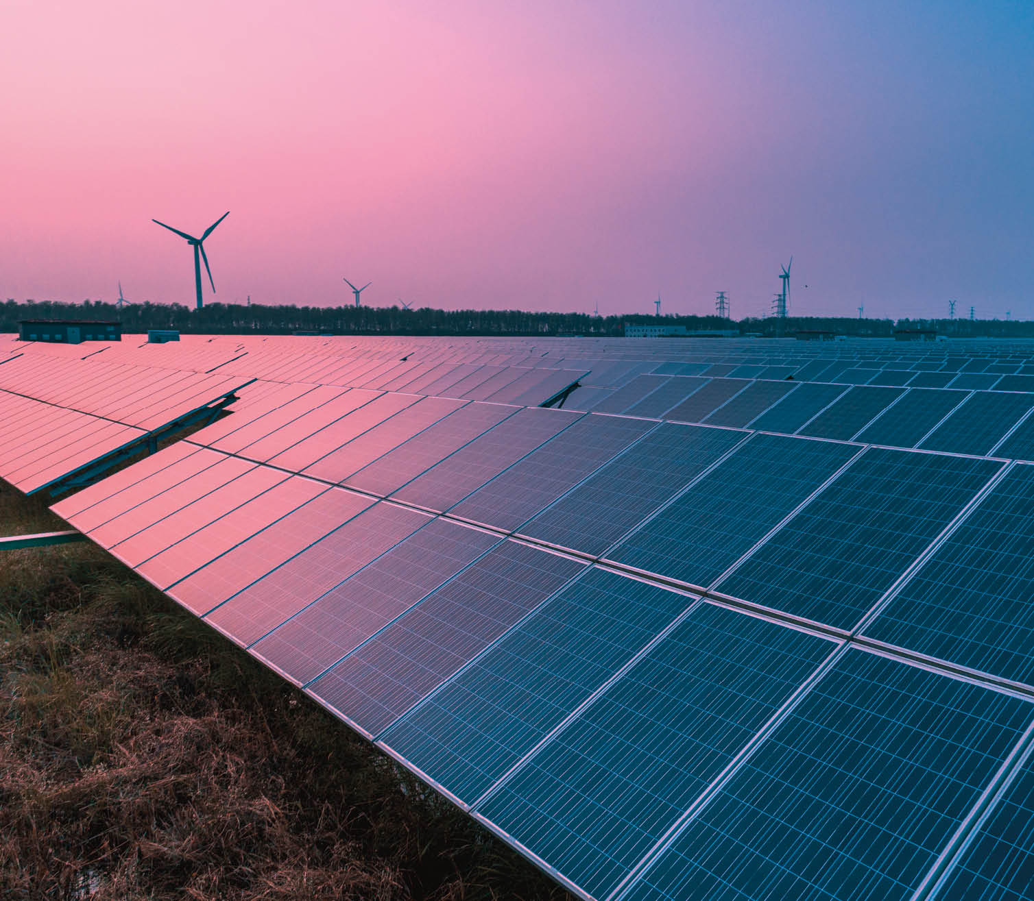 Solar panels with wind turbines on a sunny day,green clean energy concept“n