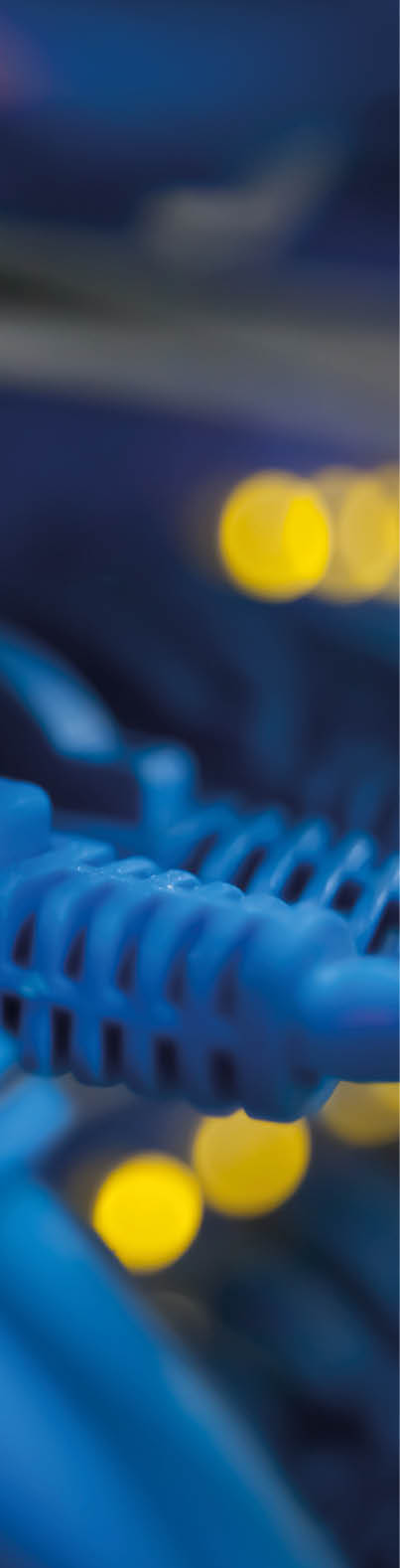 Selective focus closeup view of cables plugged into a server network panel with lights indicating activity. Photographed inside an equipment room. Canon 5D MarkII. The file has been meticulously retouched in Photoshop eliminating dust and unwanted flaws. I have over 22 years experience as a photo retoucher.