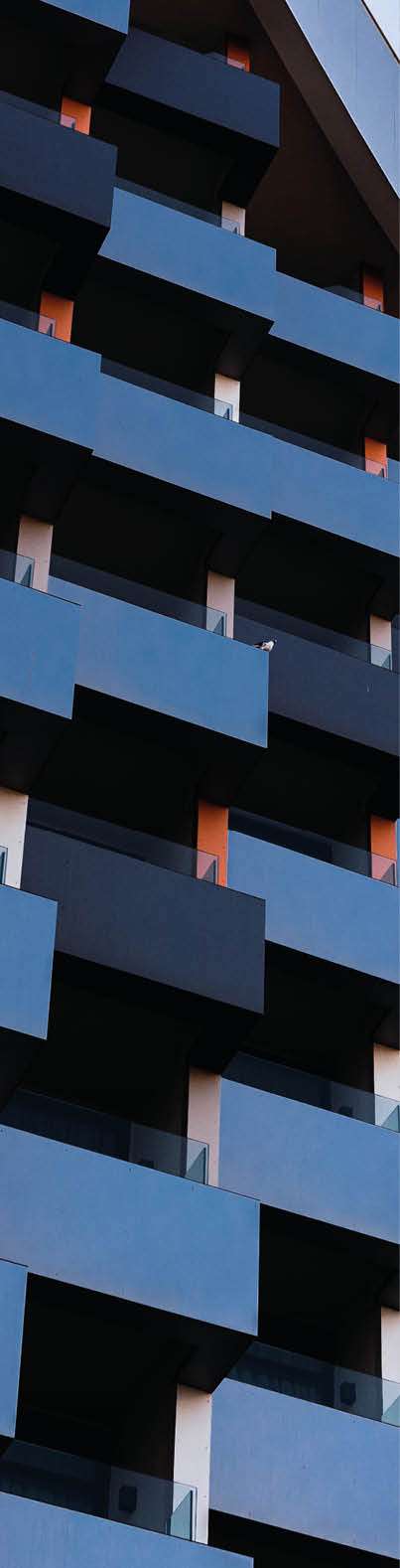 Modern building with square balconies seen from below. Modern architecture.